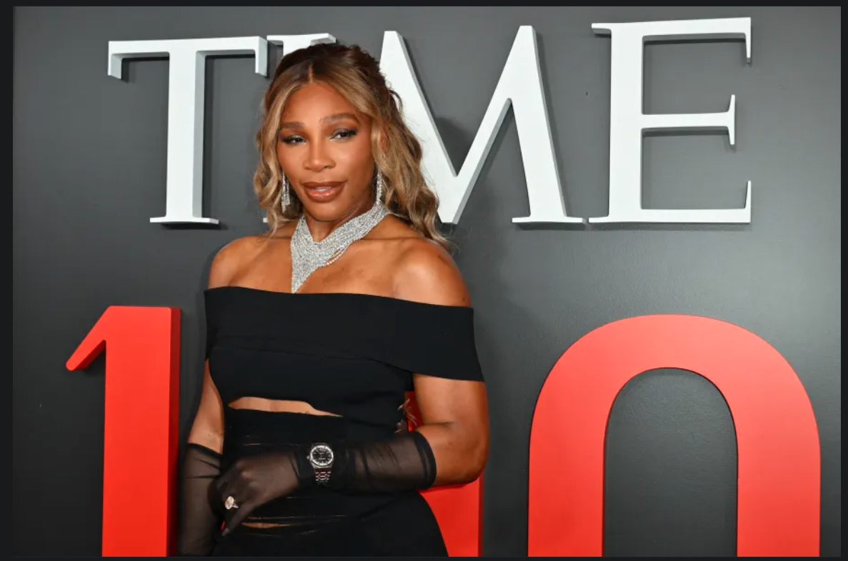 Serena Williams at a TIME100 event in a black off-shoulder gown and layered necklaces.